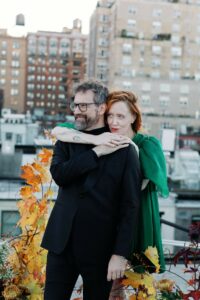 A photo of Thomas Strickland and his wife Helena Fitzgerald on the rooftop of their apartment building in the fall of 2022.
